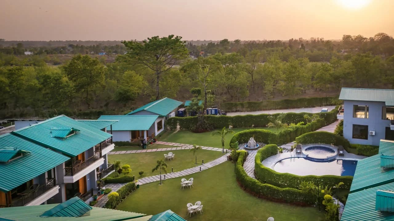Lush Landscaped Resort Gardens and Pool at Golden Hour