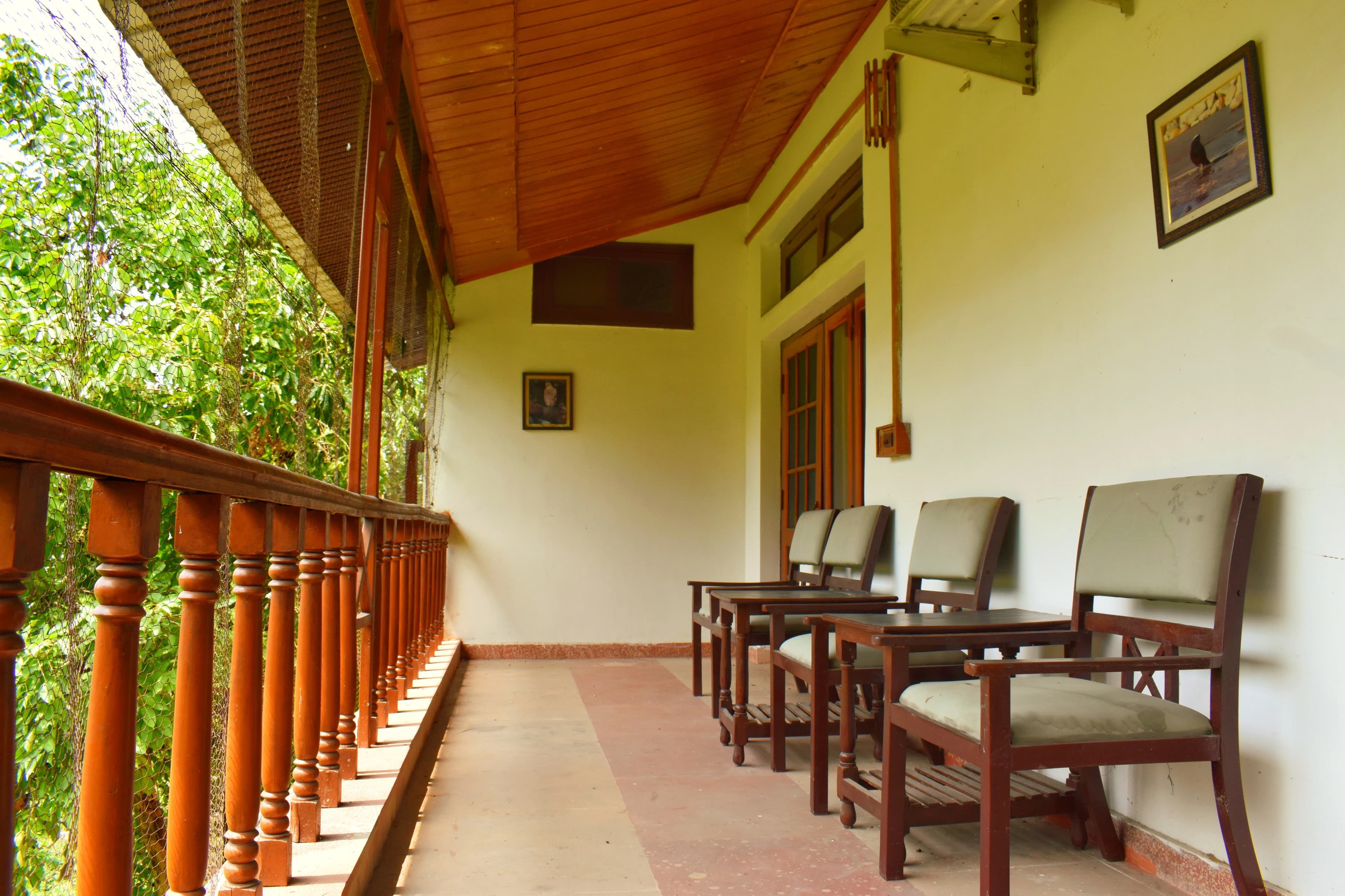 facade area of ranger's lodge with forest facing balcony