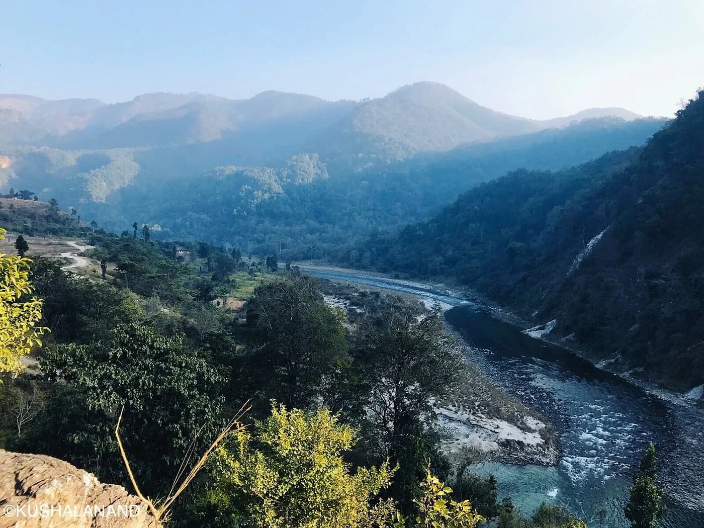 beautiful scenic view of the mountains and the river flowing